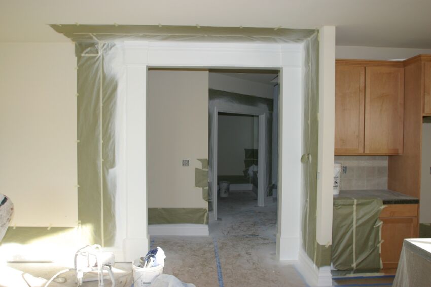 Kitchen looking toward front entry - New millwork and fresh paint